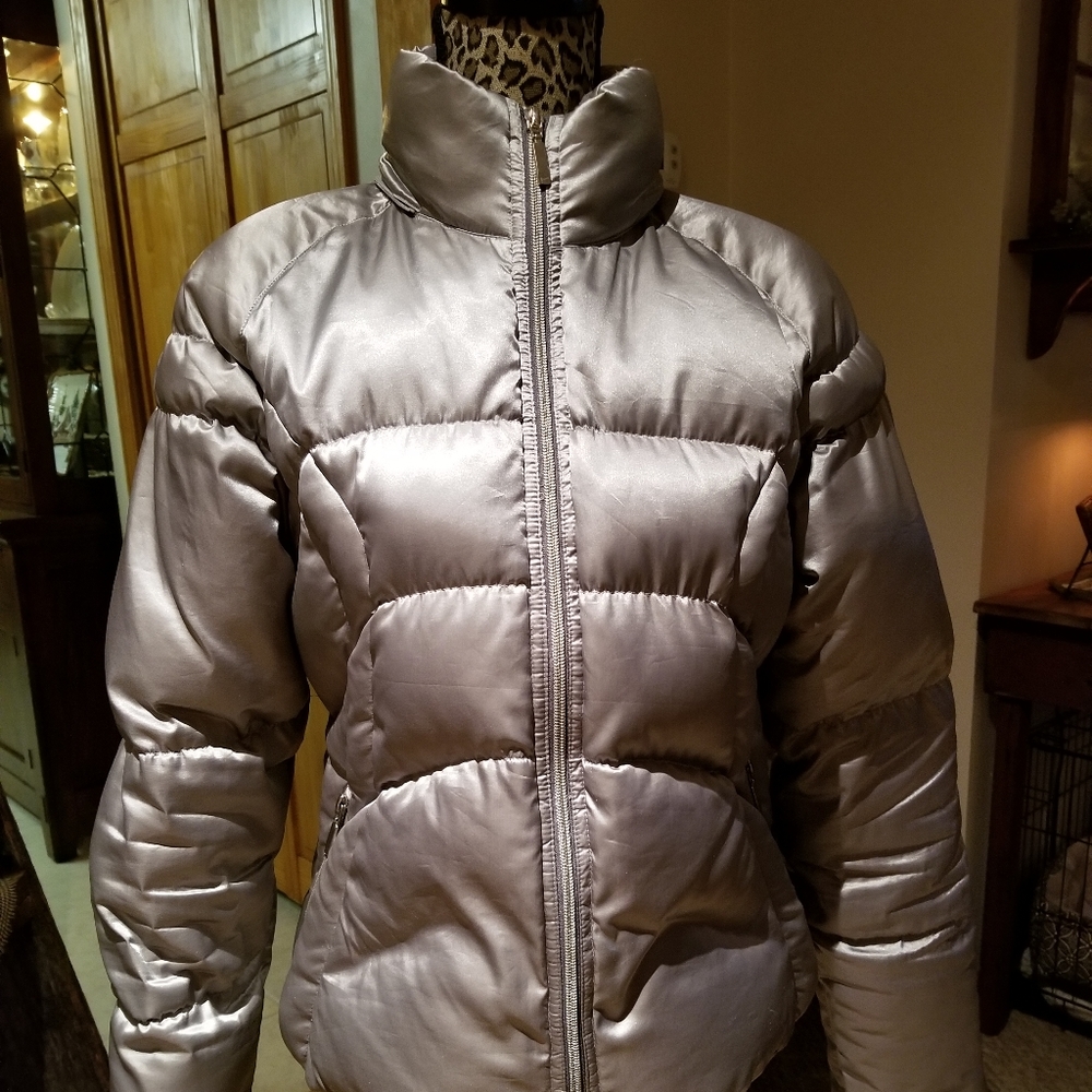 Large silver Nike puffer coat.